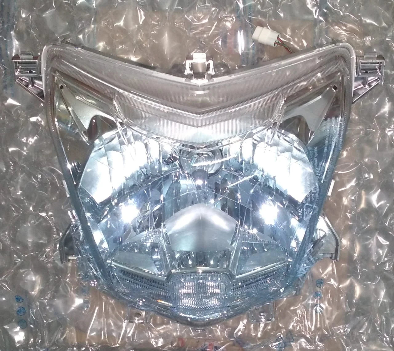 Head lamp assembly for TVS NTORQ-TVS